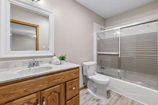 The primary bedroom enjoys a full private bathroom.