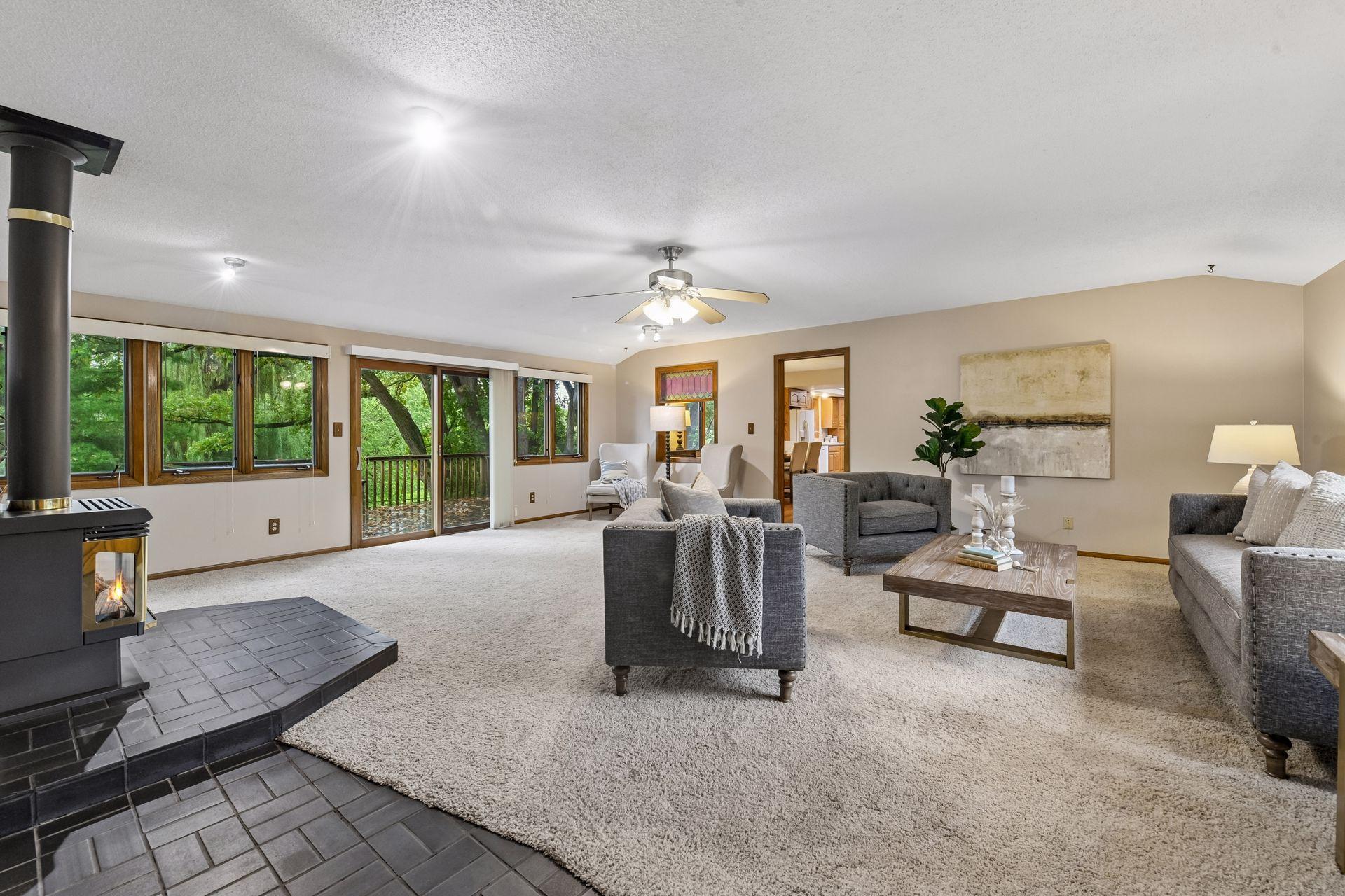 A true gathering place, the large Family Room enjoys long views out the front and back windows and offers plenty of room to spread out.