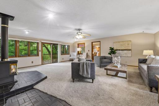 A true gathering place, the large Family Room enjoys long views out the front and back windows and offers plenty of room to spread out.