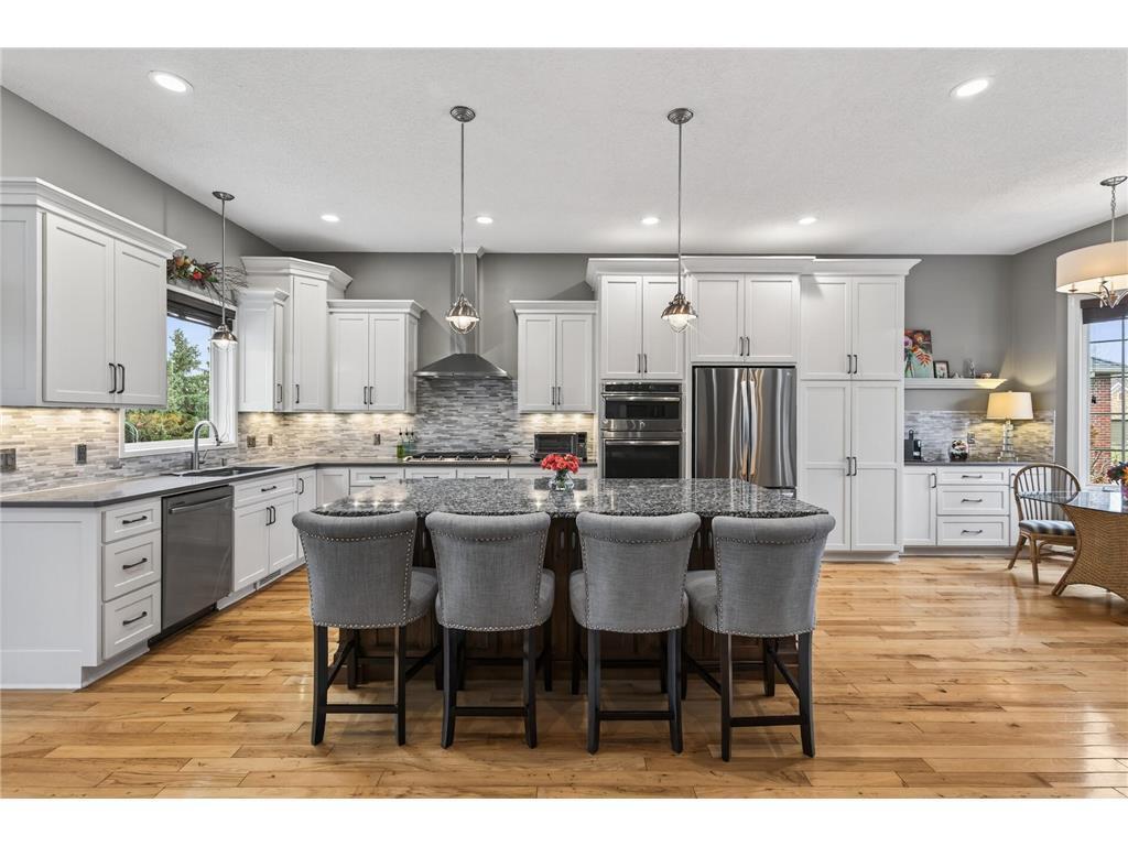 Seating for 4 on the hickory and granite island