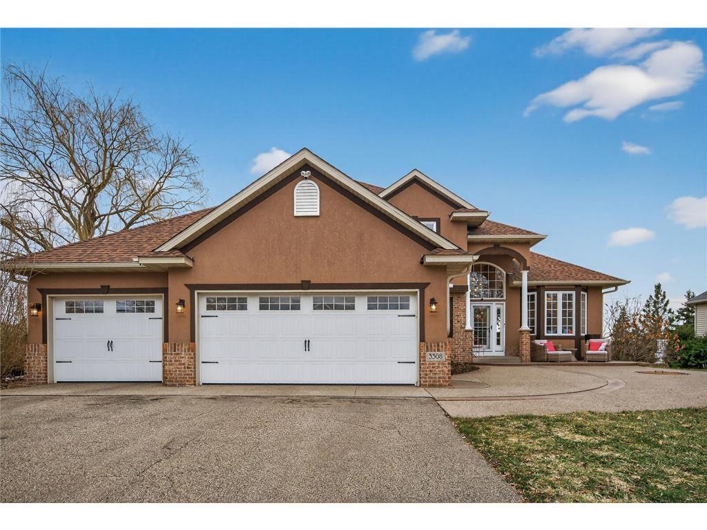 3 car heated garage with side access door