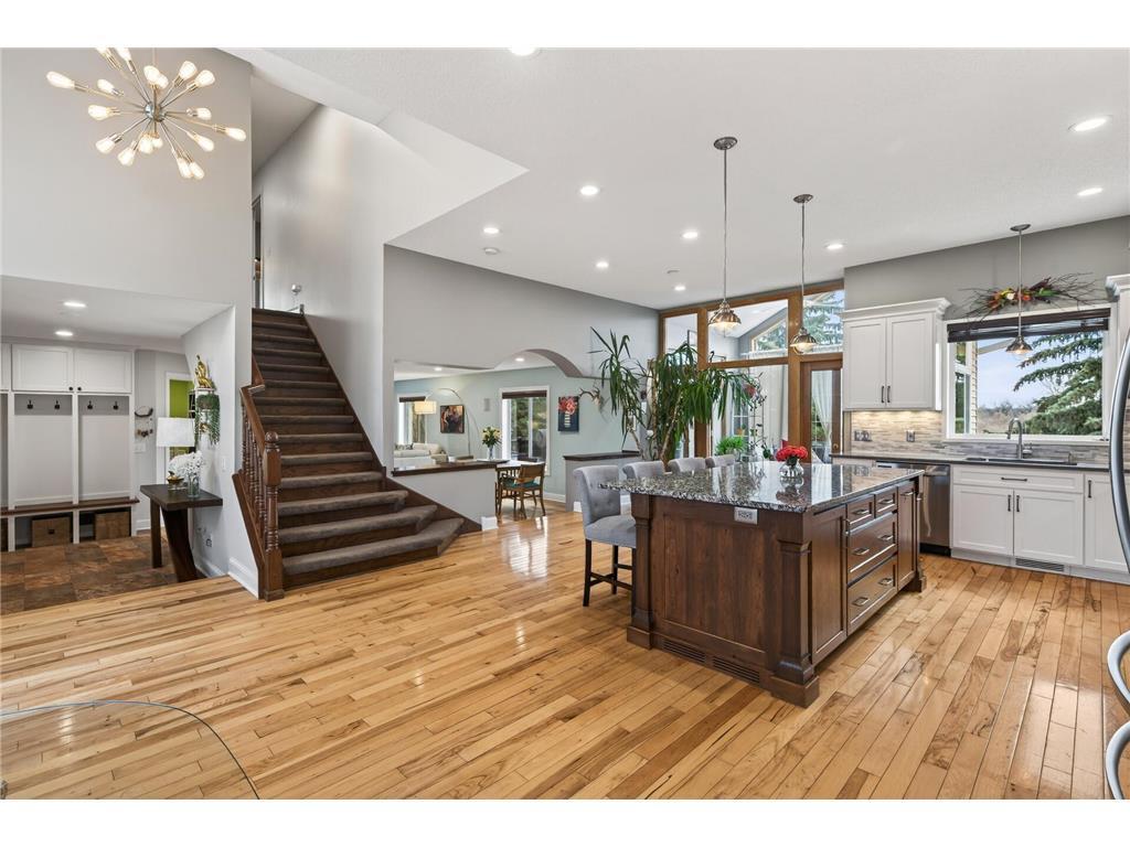 Open to sun porch, stairs, living area and front door