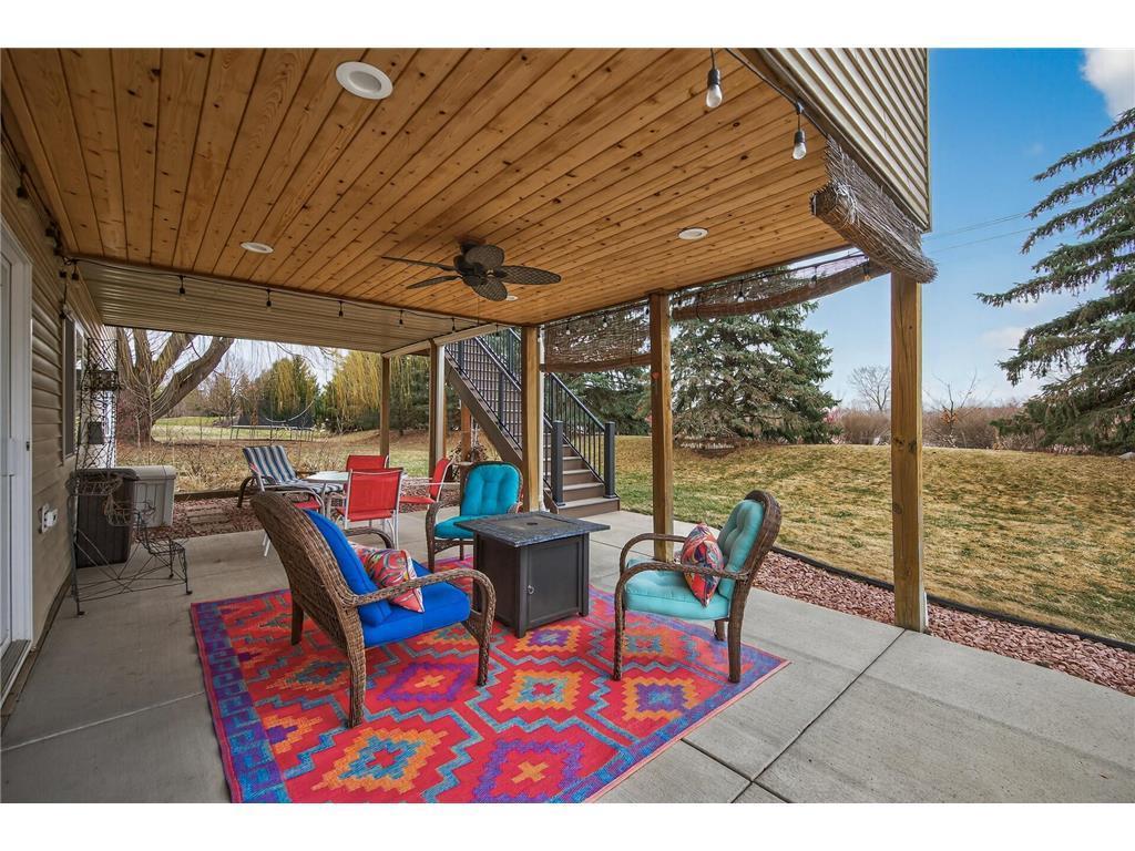 Knotty pine under decking w/can lights and fan. Perfect to watch the sunset!