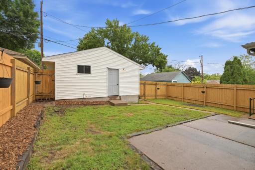 A 2-car garage plus an open carport for VIP guest parking. The roof carries a transferable 50-year manufacturer warranty.