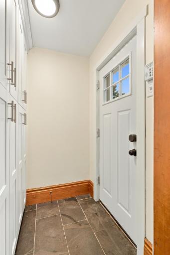 Pantry and entry area from backyard includes heated floors.