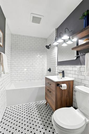 The bathroom went down to the studs in 2020 and features a new subfloor, soaking tub, in-floor heat, new plumbing, and a new main stack.