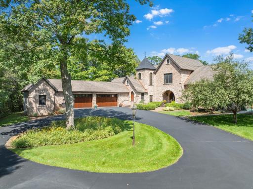 Set amid a large lawn nearly surrounded by hardwood forest and marsh, this 3 acre, resort-like estate offers exceptional privacy with minimal visibility of neighboring homes.