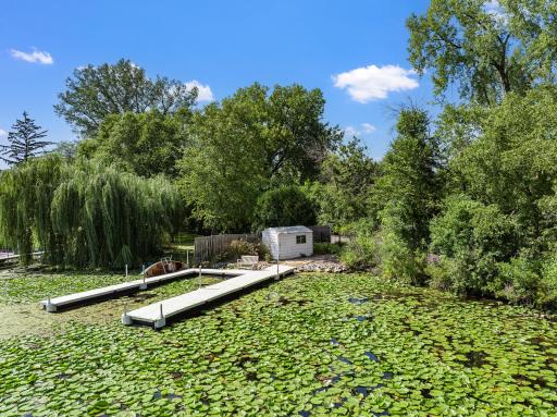 This lakeside lot features a double, 30’, floating dock system with bench that does not need to be taken out in the winter (due to inlet).