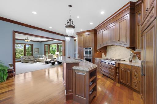 An inviting open flow connects the kitchen to the living room.