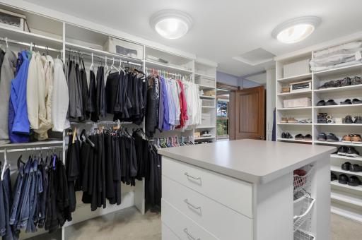A sizable walk-in closet provides beautifully organized storage and plenty of space for dressing and wardrobe essentials.