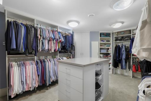 A sizable walk-in closet provides beautifully organized storage and plenty of space for dressing and wardrobe essentials.