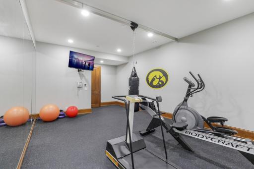 A dedicated exercise room makes it easy to prioritize wellness without leaving home.