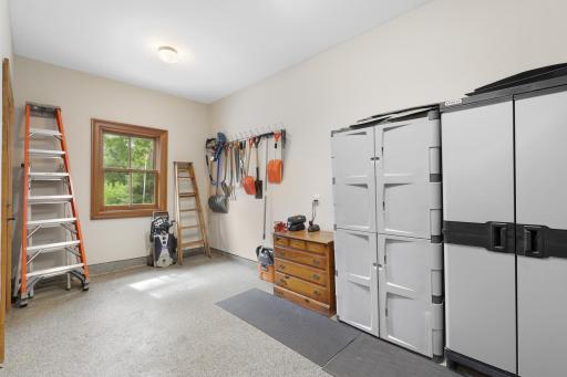 A convenient garage workspace provides a dedicated area for projects, hobbies, or storage.