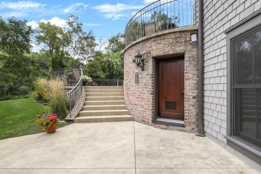 Exterior access provides convenient entry to the pool room and storage area.