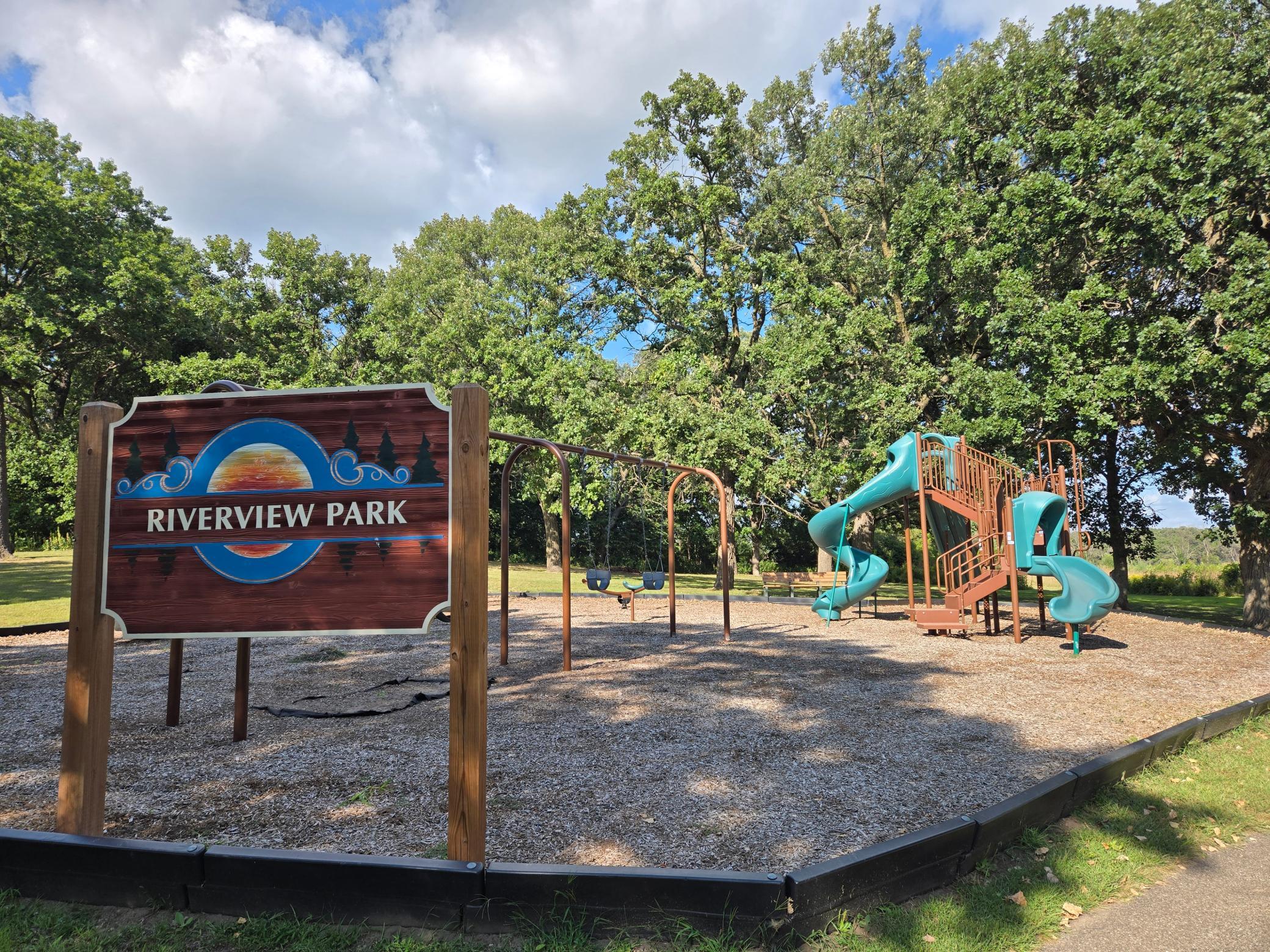 Riverview Park is just a short walk from your door step. Enjoy this modern park with swings, slides, and a spider web style climbing wall! This park has ample green space shaded by magnificent mature Oak Trees.