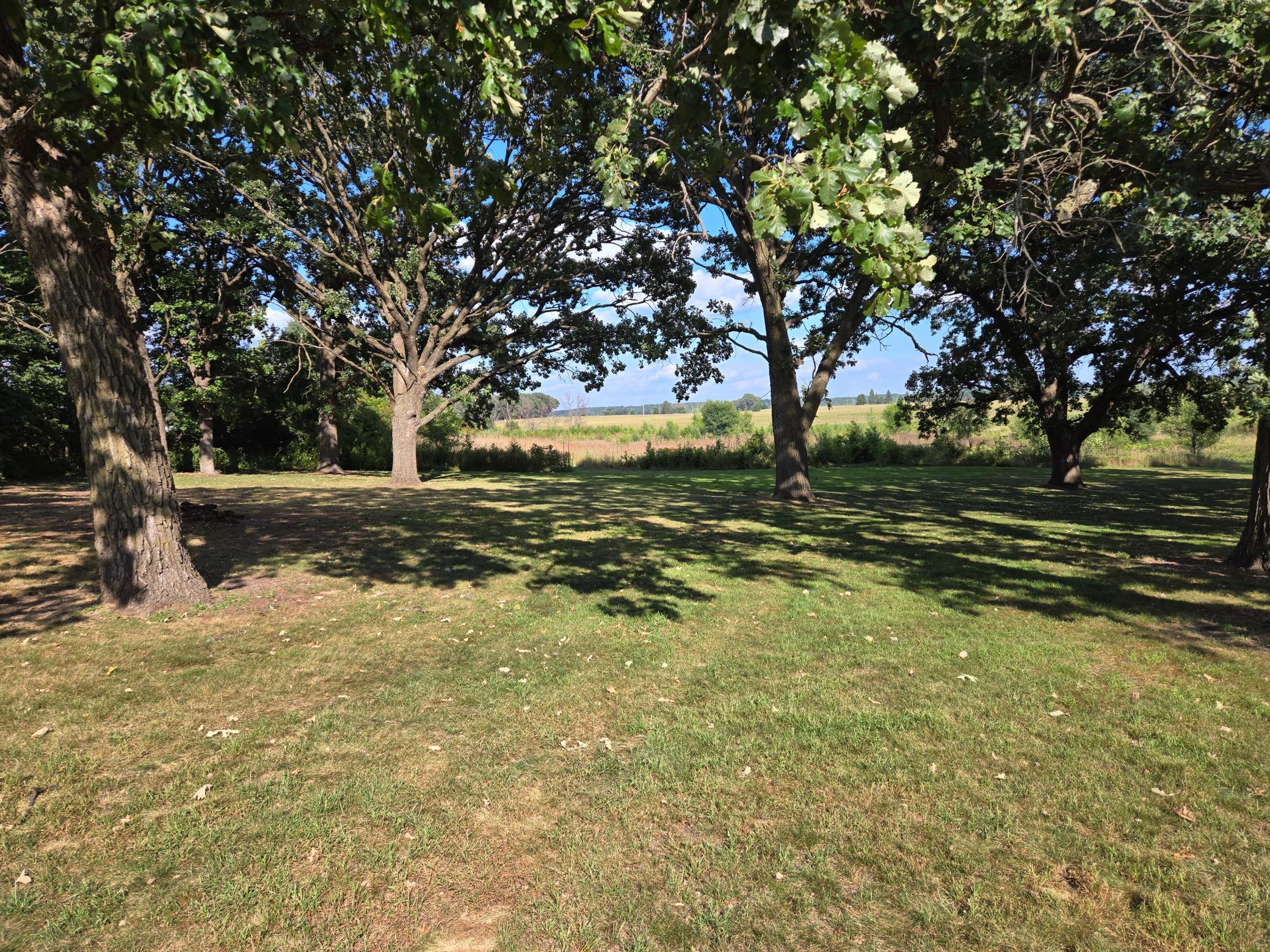 Enjoy Riverview Park of Provence on the River's Expansive Green Space with loads of shade from beautiful mature oak trees.