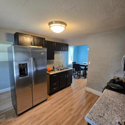 Kitchen paired with dining space.