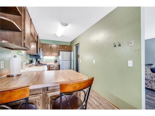 Just steps from the deck to the kitchen. Enjoy!