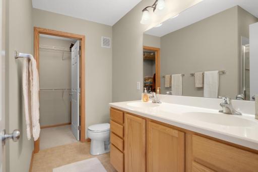 Private primary bathroom and walk-in closet
