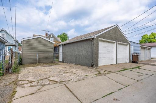 parking pad, 2 car garage, shed