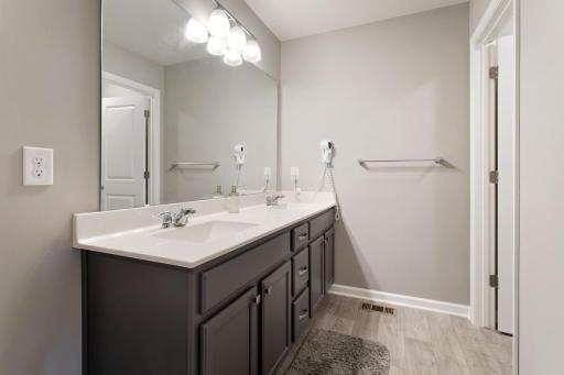 Upper level full bathroom shared