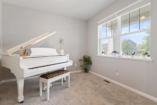 Front room- formal dining currently used as piano room