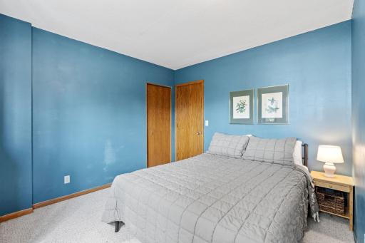 Lower level bedroom with a double closet.