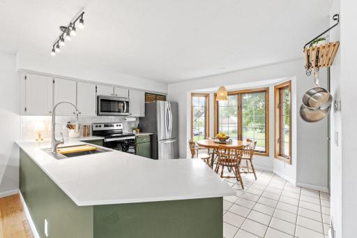 The 2023 kitchen remodel included new appliances, countertops, backsplash, sink and pantry.
