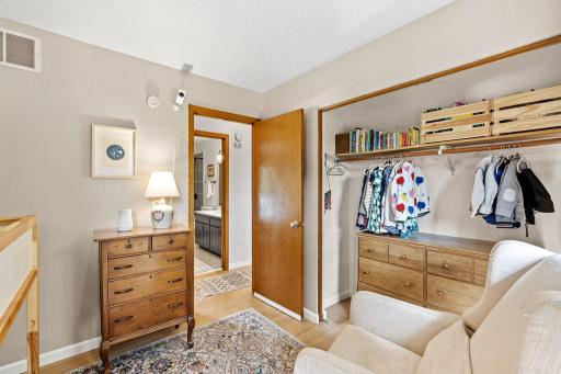2nd bedroom with a wide reach in closet