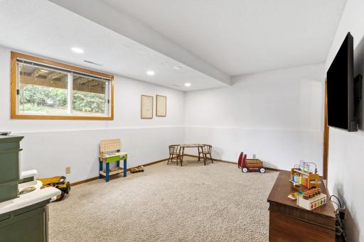 Lower level family room a wide lookout window.