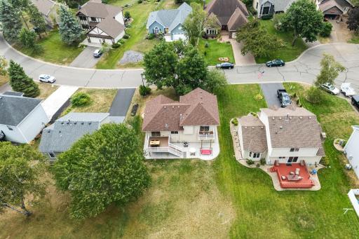 Aerial view of the street and surrounding homes.