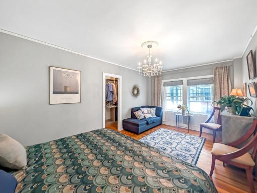 Huge bedroom with beautiful light fixture and walk-in closet!