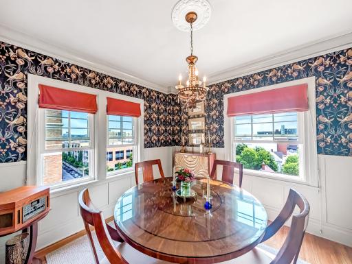 This corner dining room has so much character!