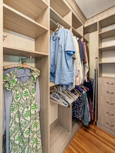 Bedroom features a walk-in closet with lots of built-in storage!