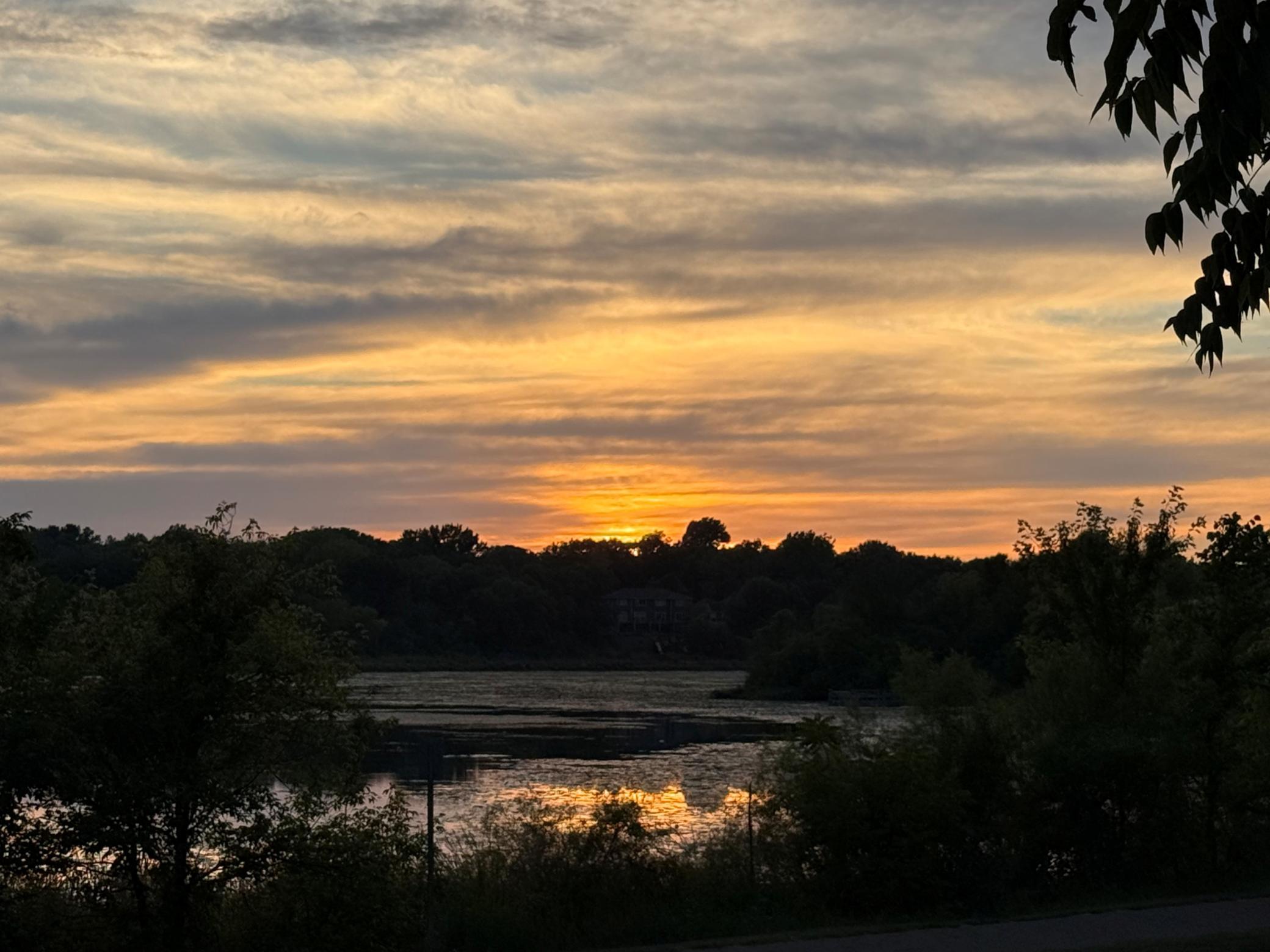 View glowing sunsets over Lake McKusick