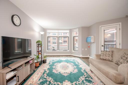 Floor to ceiling wall of windows highlight this recently renovated condo.