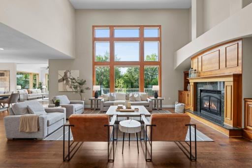 Stunning floor to ceiling windows flooding the room with natural light.