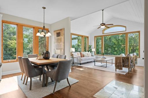 An informal dining space located inbetween the sunroom and the kitchen offering ease of everyday living and entertaining.