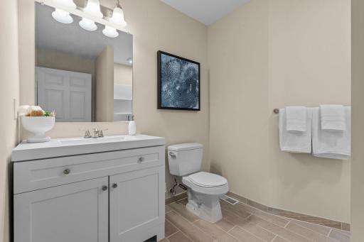 3/4 bathroom serving the upper level located across from the third bedroom.