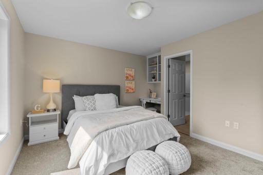Fourth bedroom on the upper level complete with a built in study/vanity overlookikng the backyard featuring a private ensuite.