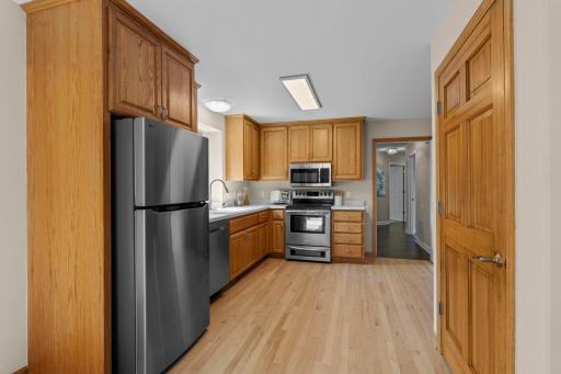 Offering independent access from the attatched garage as well as interior access to the upper level.