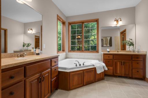 Primary ensuite complete with side yard facing windows.