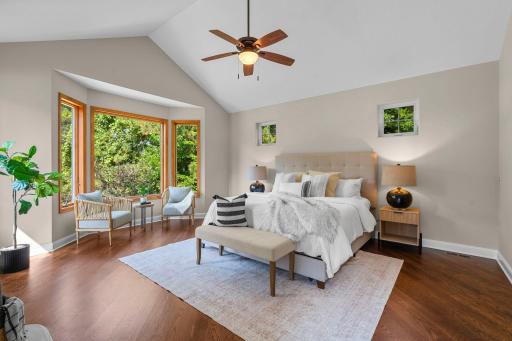 Primary suite on the main level with hardwood floors throughout.