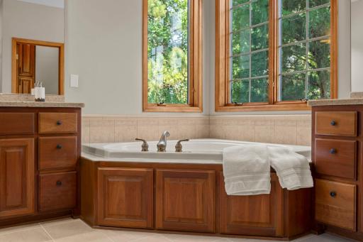 Large soaking tub perfect for relaxing.