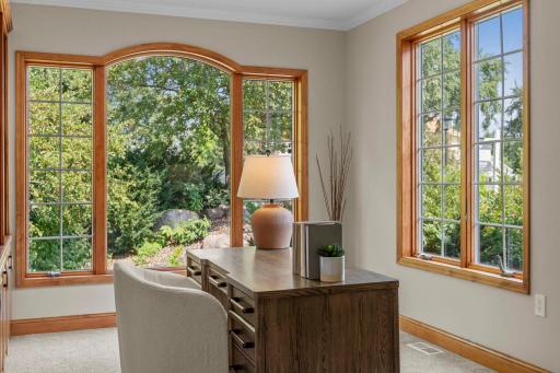 Large windows with front and side yard views filling the space with natrual light.