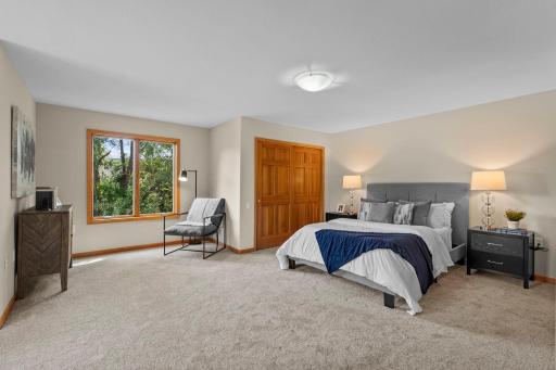 Fifth bedroom located in the mother-in-law suite, complete with dual closets.