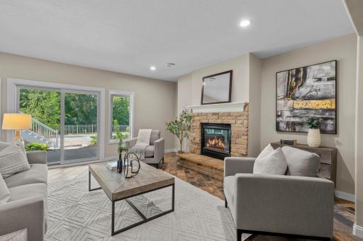Lower level family room with walk out access to the pool.