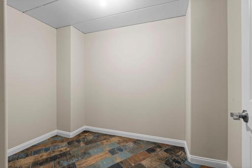 Finished storage room off of the wetbar and recreation room that could be used as a flex space.