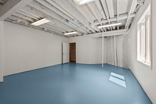 Flex space on the lower level, great for storage with double door exterior access.