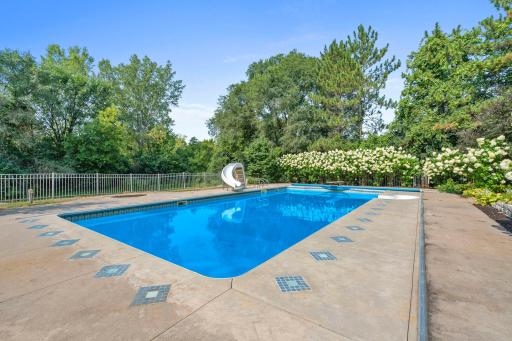 Beautiful in ground pool with stunning landscaping.
